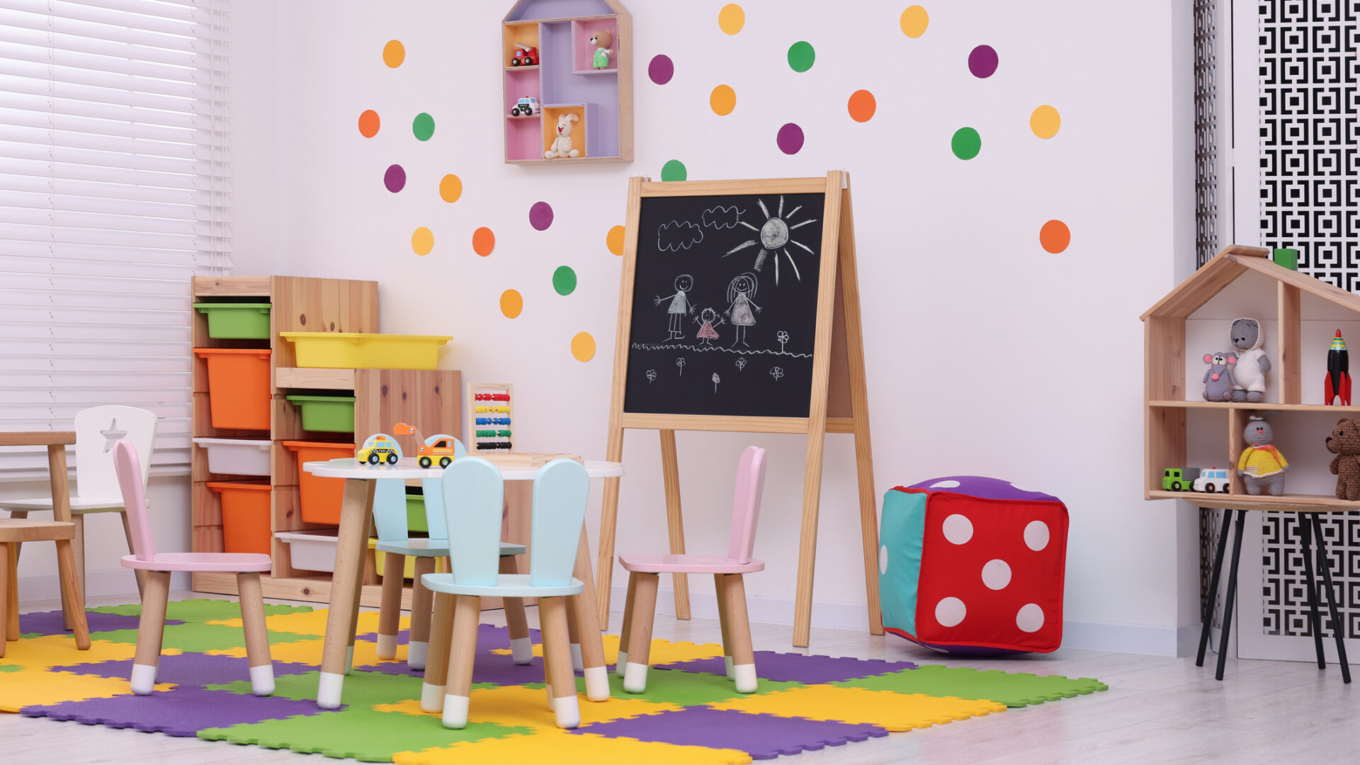 Stylish kindergarten interior with toys and modern furniture