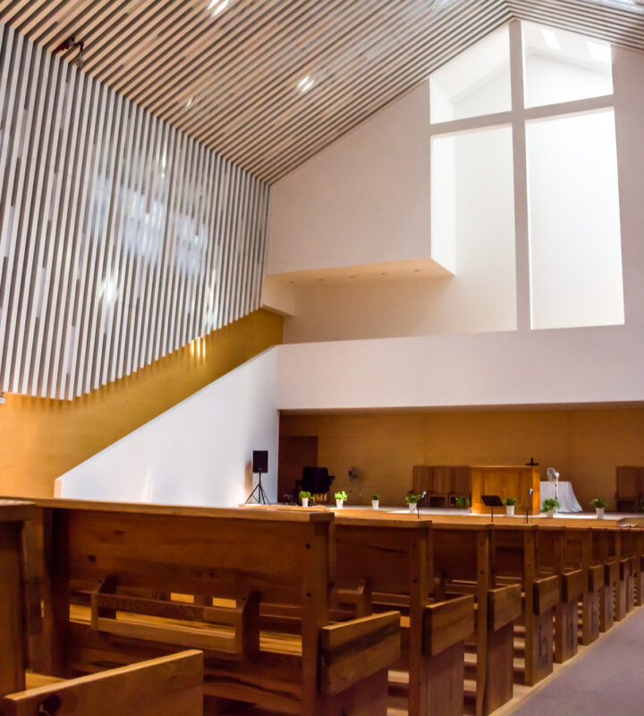 Interior view of a modern church with empty pews